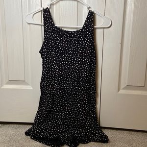 Girls black and white polkadots romper.